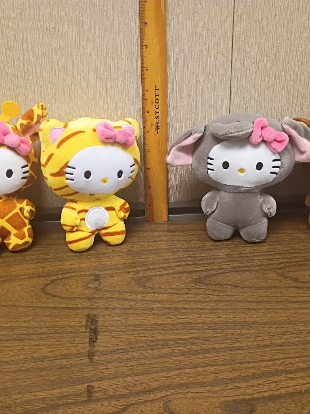 Hello Kitty Plush Disguised in Animal Costumes